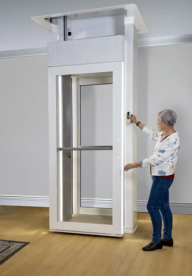 A person riding a Savaria home lift