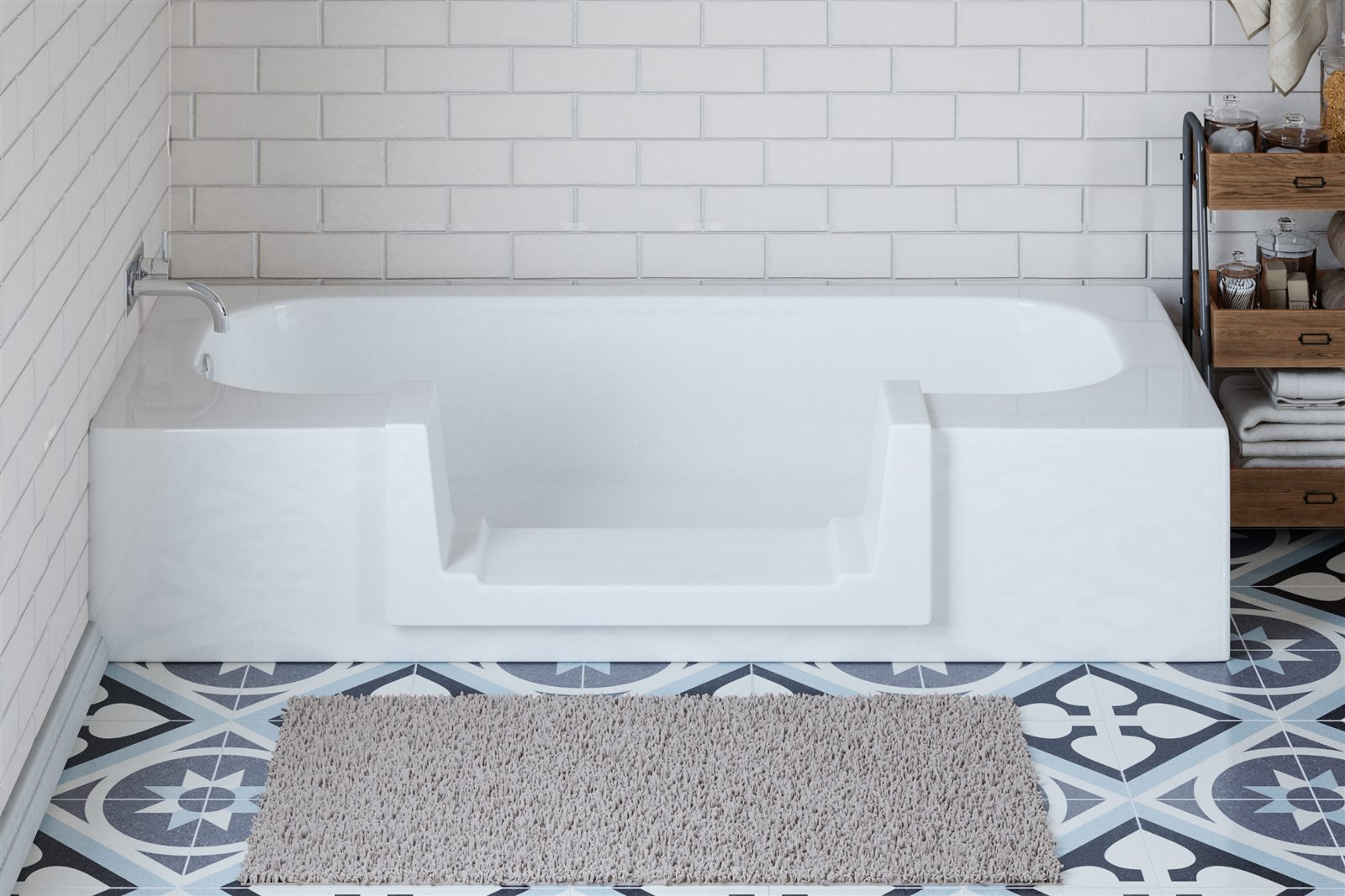 A bathtub converted to a step-in shower with the Quick Tub walk-thru insert